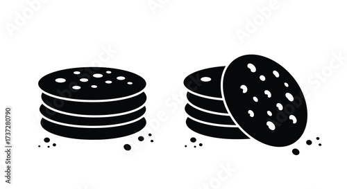 Simple black and white illustration of stacked cookies and crumbs visible