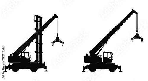 Silhouette of two industrial cranes with grappling hooks shown in black