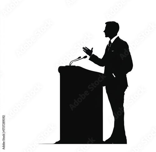 Silhouette of a confident business man delivering a speech behind a podium on white background