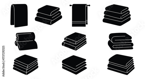 Minimalist black and white silhouettes of neatly folded towels and linens