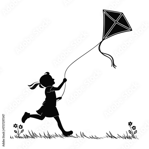 silhouette of a girl flying a kite