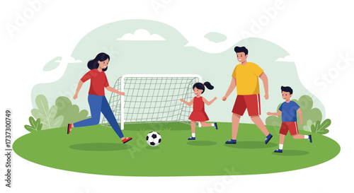 Family playing soccer together on a grassy field with a goal