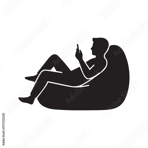 “Person relaxing while using a smartphone icon. Man lying down on a couch or bed, browsing the internet. Leisure and technology symbol.”
