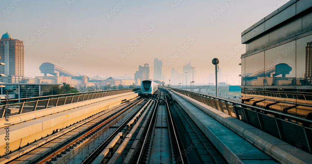 Fototapeta premium monorail Metro In Dubai, United Arab Emirates. FPV POV At Fast Speed Drive Motion. driverless metro. futuristic city skyline in UAE.street motion Dubai Subway Tunnel