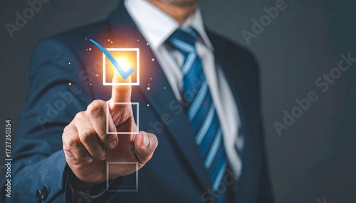 Man clicks on a checklist to confirm task completion during a business meeting in a modern office setting