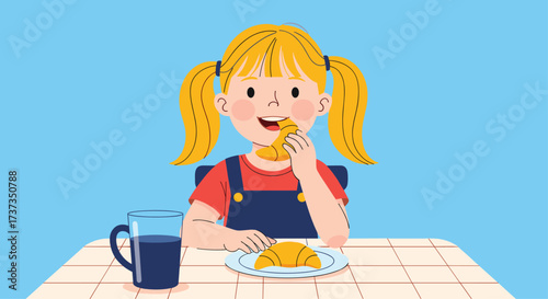 A happy young girl with blonde pigtails eats a croissant for breakfast with a drink.