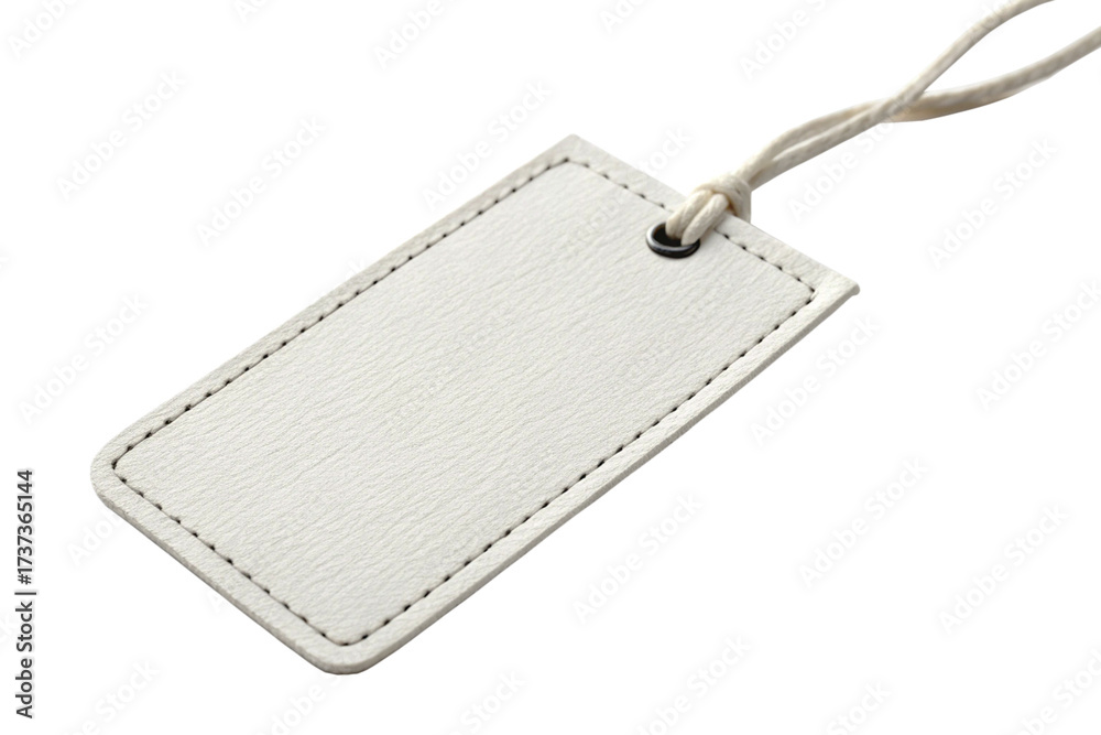 Fototapeta premium White sewn leather tag with isolated yarn thread on white background