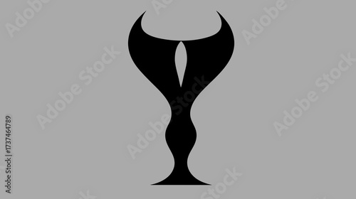 Elegant abstract black symmetrical design on a grey background, featuring a stylized goblet or horned creature with a central eye-like slit, modern artistic emblem.