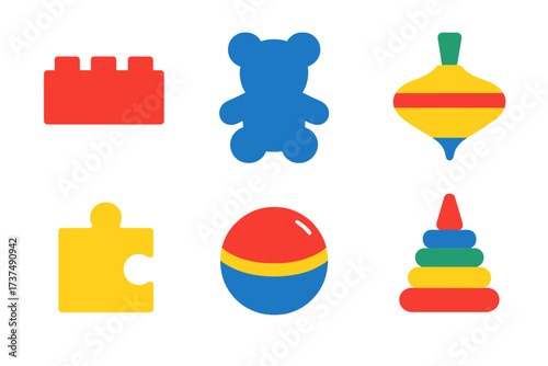 Colorful toys including building blocks, a teddy bear, a top, a puzzle piece, a ball, and a stacking ring on a white background