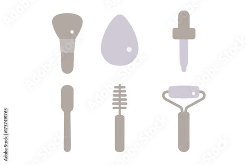 Tools for makeup application and skincare routine displayed on a clean background