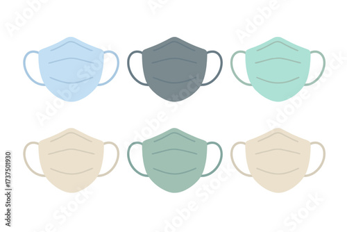 Different colors and styles of face masks arranged in a grid on a light background for health and safety purposes