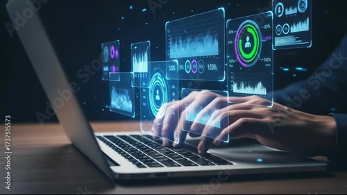 Hands typing on a laptop with futuristic holographic data visualizations and charts floating in the air, representing technology and analytics