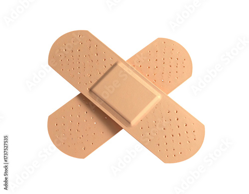 Two beige medical adhesive bandages arranged in an overlapping 