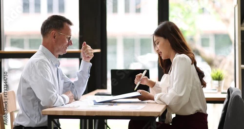 Business planning for budget, payment and research for life insurance. Transaction, accounting and man with woman, pc and mortgage for investment and taxes
