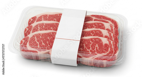 Raw marbled beef steaks in plastic packaging isolated on white background