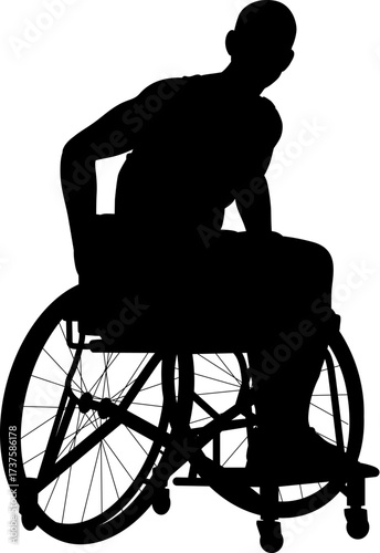 Silhouette of man seated in sports wheelchair, leaning forward in an athletic stance.