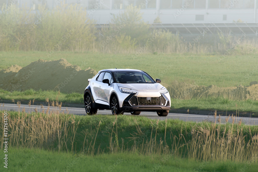 Fototapeta premium SUV driving on open road