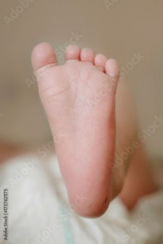 newborn baby photography close-up foot head and ear