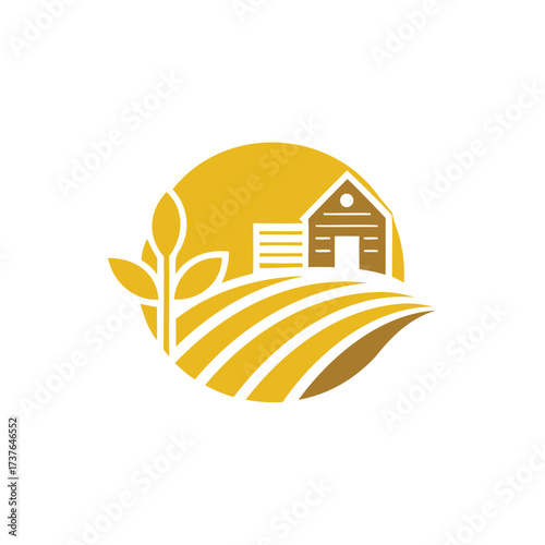 Golden farm landscape with barn and growing plant