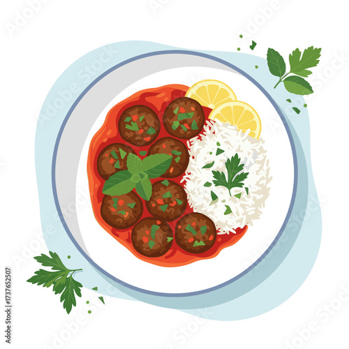 Delicious meatballs in a rich tomato sauce served with fluffy rice and fresh lemon wedges.
