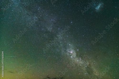 The busy night sky, milky way and meteor