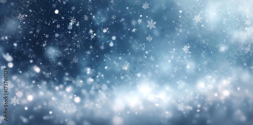 Snowflakes Falling on Blue Winter Background