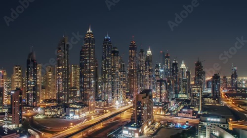 Wallpaper Mural City skyline at dusk with illuminated skyscrapers and road infrastructure Torontodigital.ca