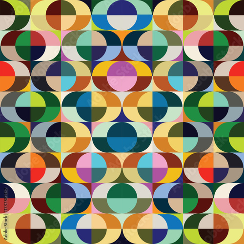 Geometric abstract pattern featuring retro inspired interlocking circles and rectangles in a vibrant color palette of blue, green, brown, and pink. 
