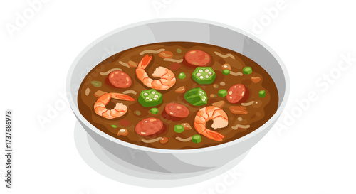 Delicious bowl of traditional gumbo with shrimp and sausage in a white bowl