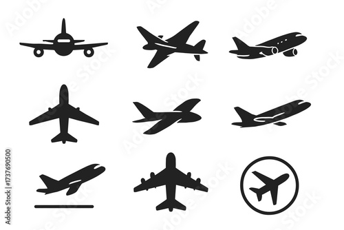 Set of nine airplane silhouettes in various angles and positions