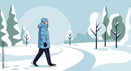 Man in a down coat walking along a snowy path in a winter landscape