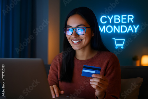 Happy Woman Holding Credit Card Shopping Online On Cyber Monday Night