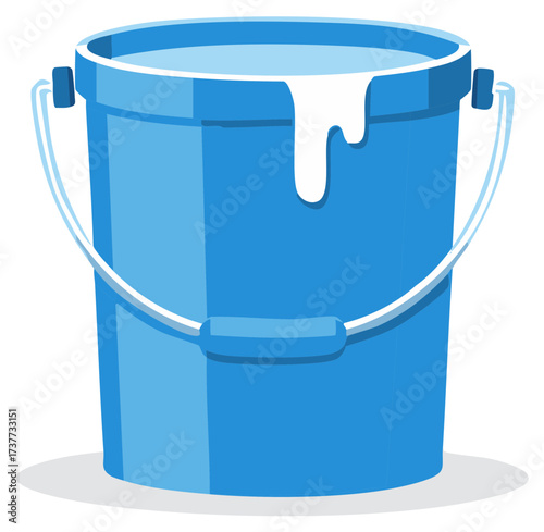 Blue bucket with white paint spilling over the rim and handle