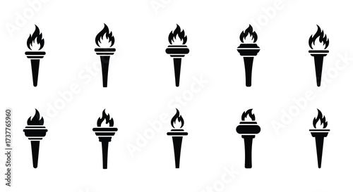 A collection of black silhouette torches with flickering flames displayed neatly