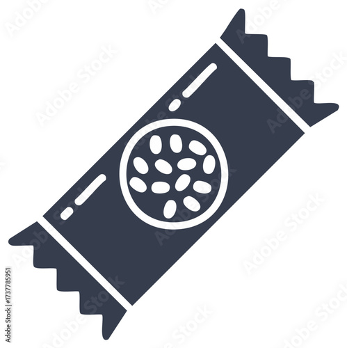 Dark packaged snack bar with visible seeds and serrated edges