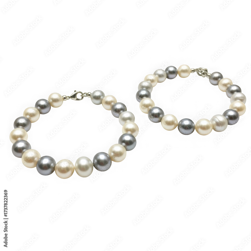 Obraz premium Two pearl bracelets, one with gray and white pearls, isolated on transparent background
