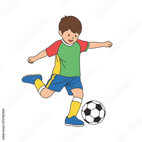 A young boy in a colorful soccer uniform smiles as he kicks a classic football.