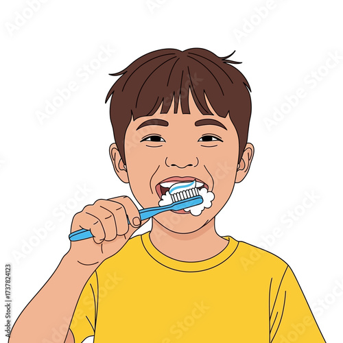 A young boy with brown hair and a yellow shirt brushes his teeth with a blue toothbrush and white toothpaste, creating foam in his mouth.