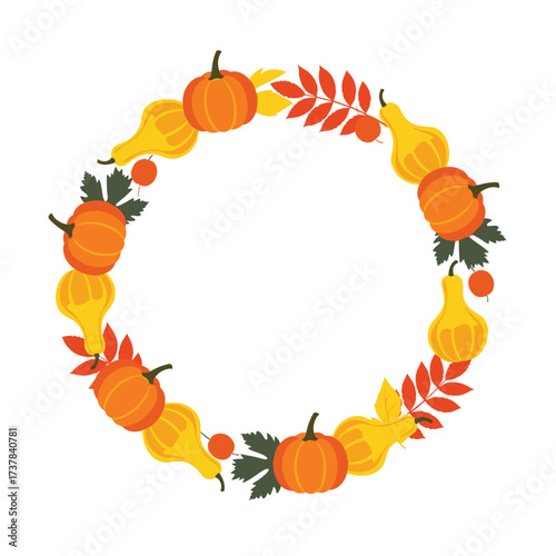 Autumnal harvest wreath with pumpkins gourds and leaves.