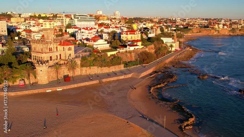 Portugal travel , scenic places. Estoril coastal town popular summer destination.  Aerial drone 4k hd footage of sandy beach Tamariz and castle