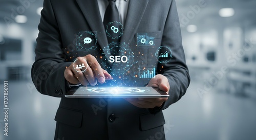 Businessman Analyzing SEO with Futurist Tablet