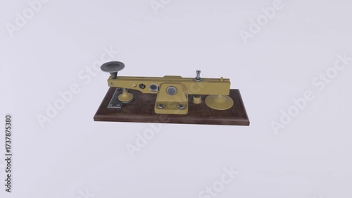 Vintage Brass Telegraph Key Rotating in a 3d Render on White