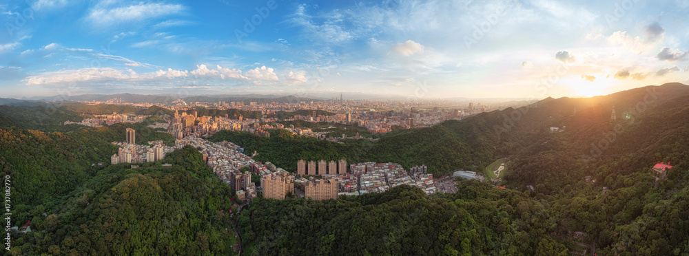Naklejka premium Aerial panorama of Taipei city at sunset, Taiwan.