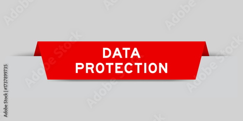 Red color inserted label with word data governance on gray background