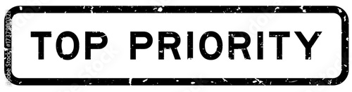 Grunge black top priority word rubber square seal stamp on white background