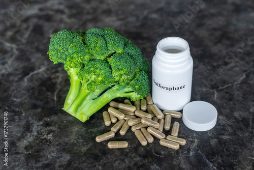 Fotografie Broccoli contains sulforaphane on the table. Selective focus.