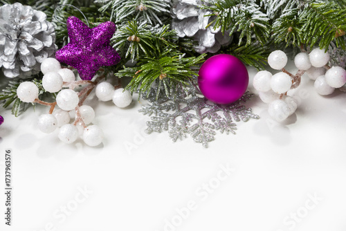 Christmas card with fir branches and Christmas decorations