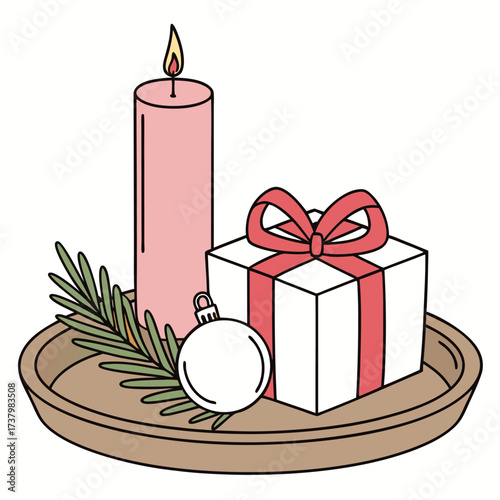 Ornament, gift, candle and cedar branch rest upon a wooden plate with transparent background
