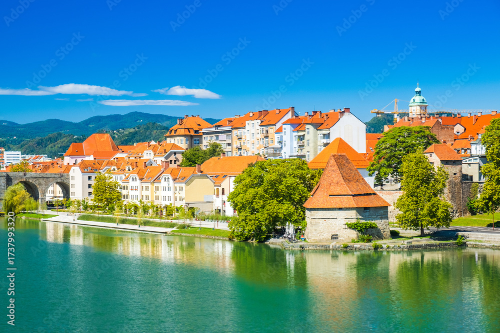 Obraz premium Amazing old water tower and banks of Drava river in Maribor, Slovenia