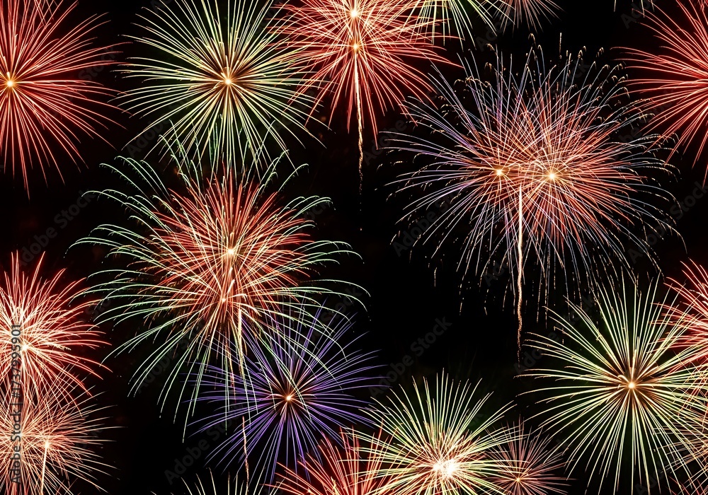 Naklejka premium Vibrant fireworks exploding in the night sky, celebrating holidays, festivals, and special events with dazzling light displays